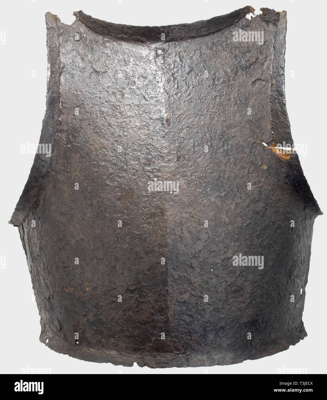 A breastplate for a suit of armour, presumably Italian, circa 1500 An iron breastplate forged in one piece with a central ridge over its entire height, and narrow flanges at the neck and arm cutouts. narrow, angular rims. Corroded, restored, damaged. Height 35 cm. Weight 1172 g. Cf. Karchewski Jr./Thom Richardson, Medieval Armour from Rhodes, Breastplate 4.92, p. 73, also the photo from circa 1910/20 of a show case at the Parisian Art Dealers, Victor and Louis Bacherau containing pieces of armour from Rhodes, Fig. 10, p. xiii. historic, historica, Additional-Rights-Clearance-Info-Not-Available Stock Photo