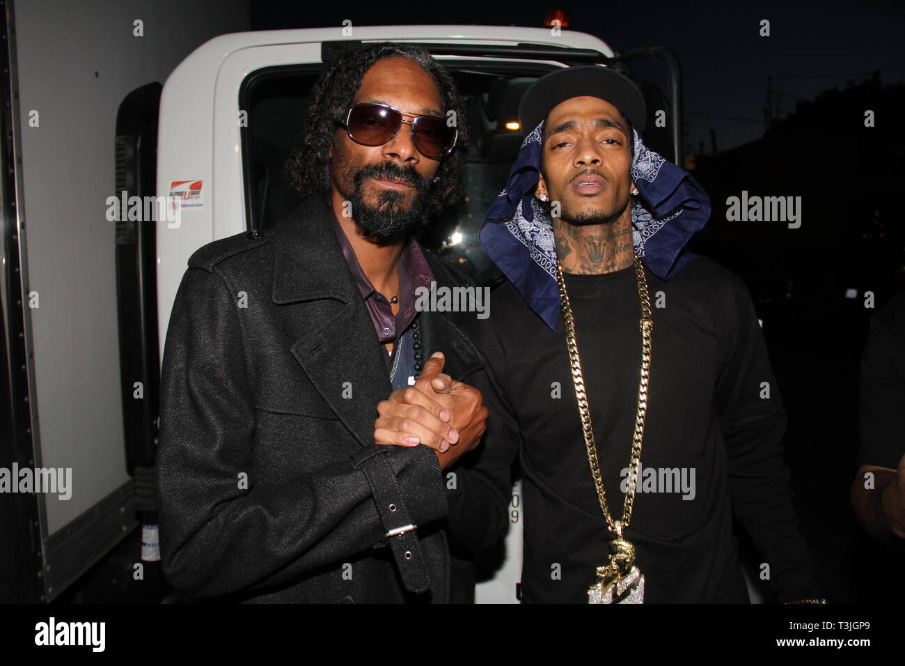 West Hollywood, Ca. 11th Feb, 2019. Snoop Dogg & Nipsey Hussle on the set of the Young Jeezy 'R.I.P.' Video Shoot at Greystone Manor February 11, 2013 in West Hollywood, California. Credit: Walik Goshorn/Mediapunch/Alamy Live News Stock Photo