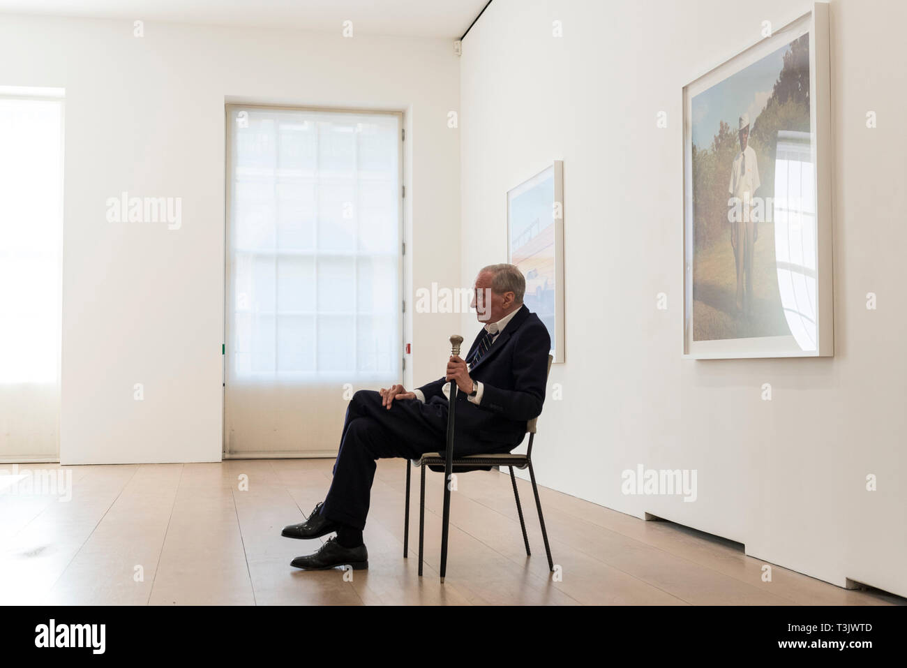 London, UK.  10 April 2019.  American photographer William Eggleston poses in front of his works from his new exhibition '2¼' at the David Zwirner gallery in Mayfair.  The show comprises a series of square-format colour photographs taken around 1977 throughout California and the American South and will run April 12 to June 1, 2019.  Credit: Stephen Chung / Alamy Live News Stock Photo