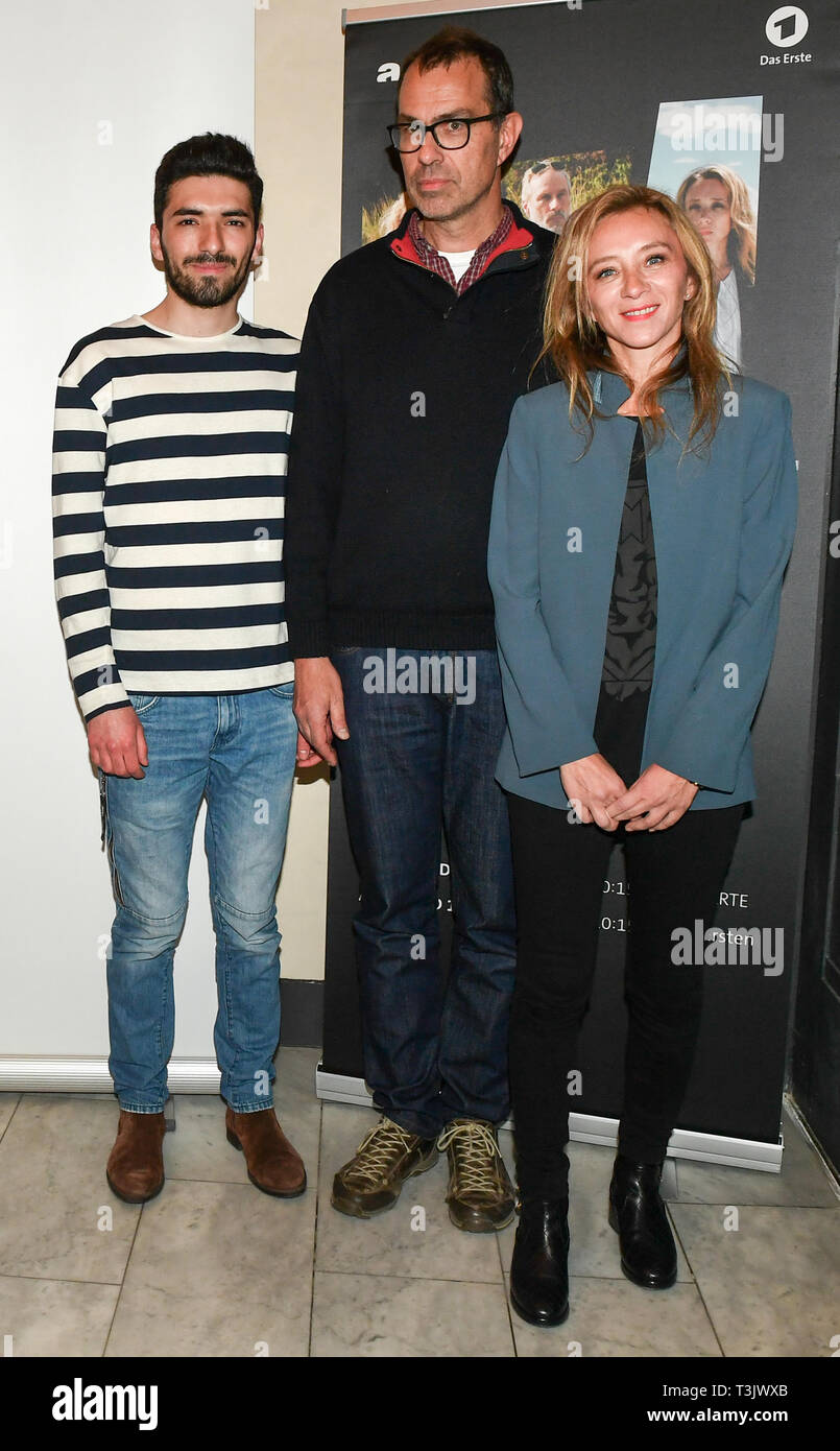 Berlin, Germany. 09th Apr, 2019. The actor Adnan Jafar (l-r), the director Dominik Moll and the actress Sylvie Testud come to the German premiere of the series 'Eden' in the Kant cinema. In the new series, which Arte wants to start in May, the story of refugees and refugee helpers will be told in six episodes. Credit: Jens Kalaene/dpa-Zentralbild/dpa/Alamy Live News Stock Photo