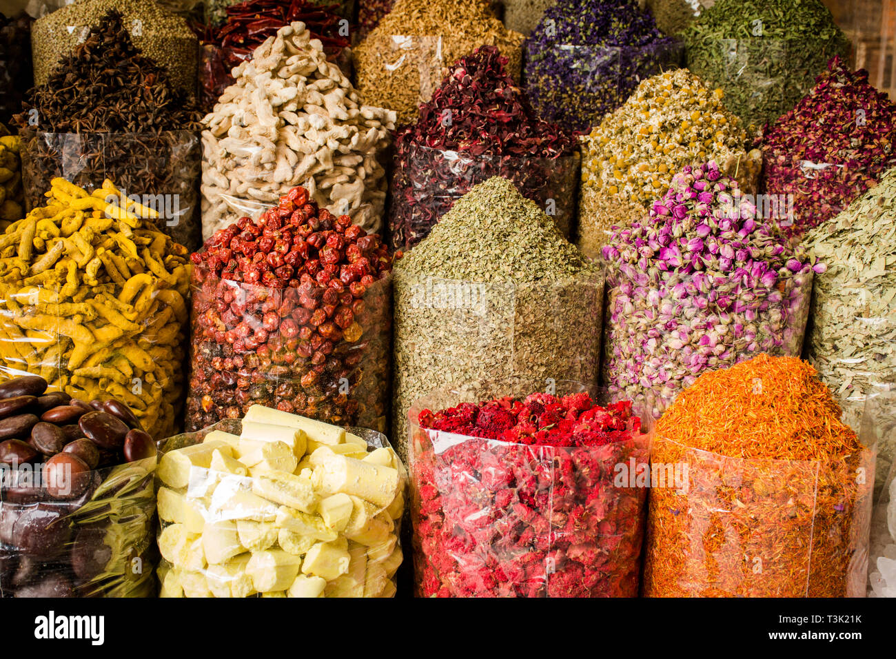 Colorful Spices in spice souk Dubai, all dried herbs nuts and flower