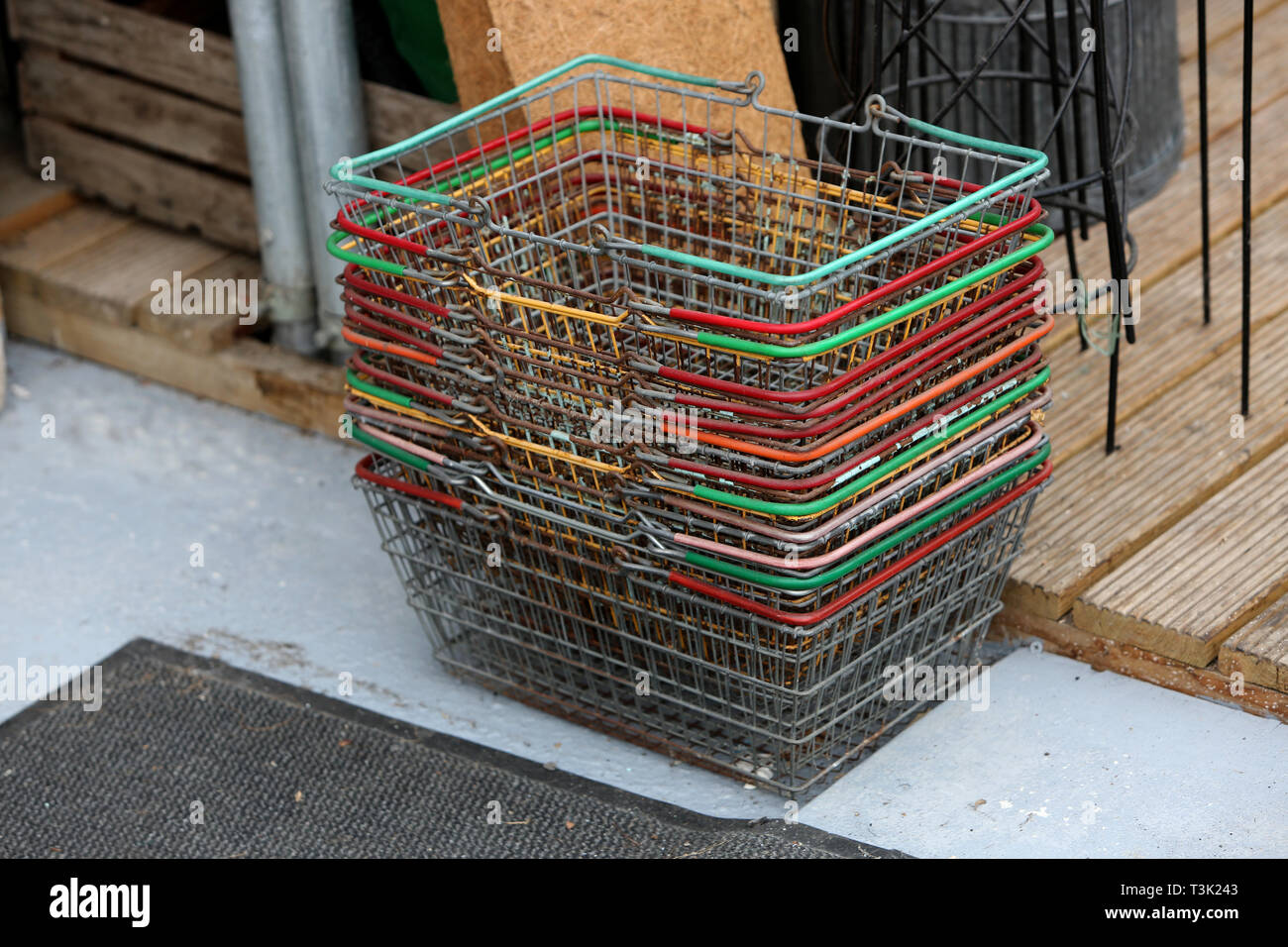 General view of a stack of shopping baskets in a vintage shop in