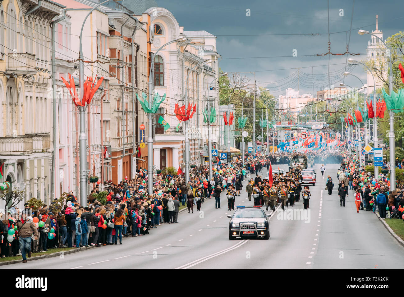 Gomel, Belarus. Ceremonial Procession Of Parade. Military, Civilian People And Enginery On Festive Decorated Street. Celebration Victory Day. Stock Photo