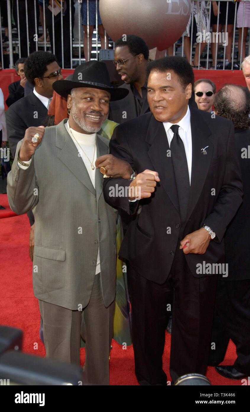 LOS ANGELES, CA. July 10, 2002: Former boxers MUHAMMAD ALI (right) & JOE FRAZIER at the 10th Annual ESPY Sports Awards in Hollywood. © Paul Smith / Featureflash Stock Photo
