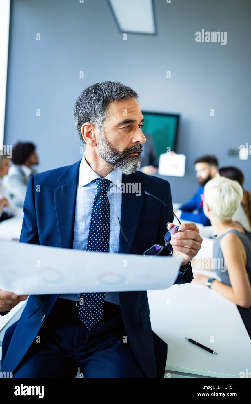 Business people conference in modern meeting room Stock Photo