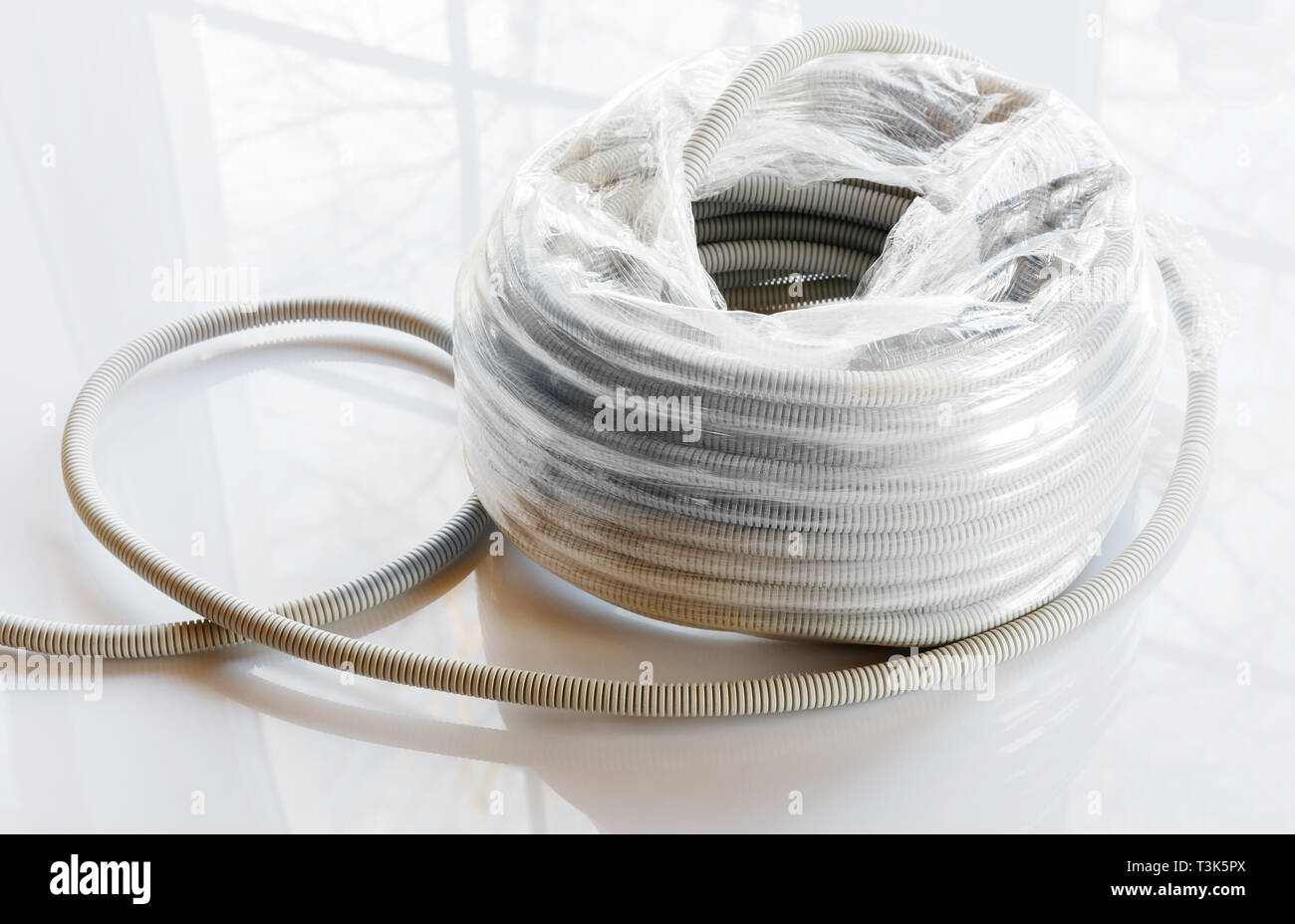 Corrugated gray plastic pipes used for electrical lines Stock Photo Alamy