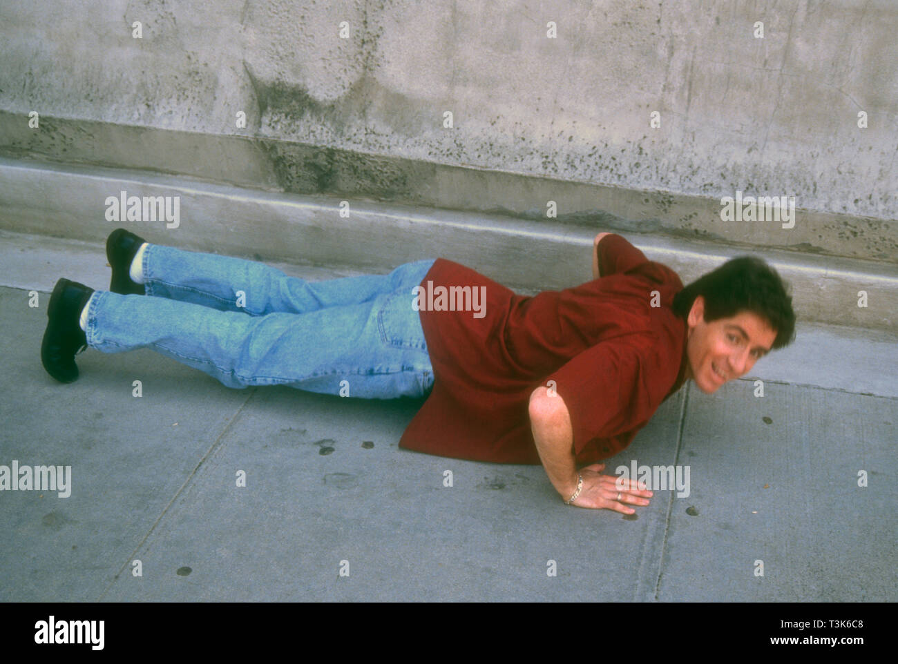 Los Angeles, California, USA 17th March 1994 (Exclusive) American Stand-up Comedian Carlos Alazraqui poses at a photo shoot on March 17, 1994 in Los Angeles, California, USA. Photo by Barry King/Alamy Stock Photo Stock Photo
