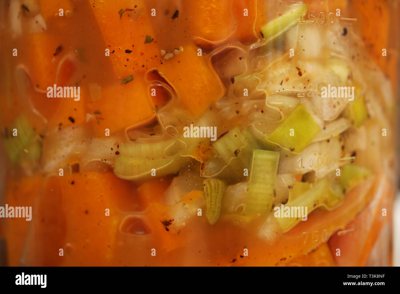 A load of tasty food pictured in a food processor ready to be blended to make soup, pictured in a home in Southampton, Hampshire, UK. Stock Photo