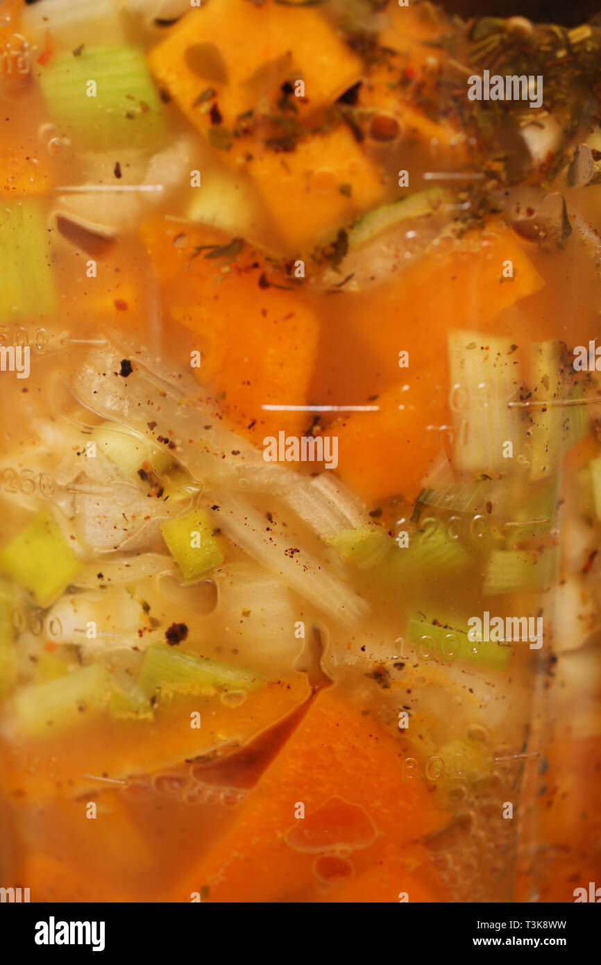 A load of tasty food pictured in a food processor ready to be blended to make soup, pictured in a home in Southampton, Hampshire, UK. Stock Photo