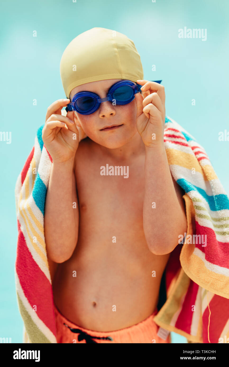 Boy swimming and cap hi-res stock photography and images - Alamy