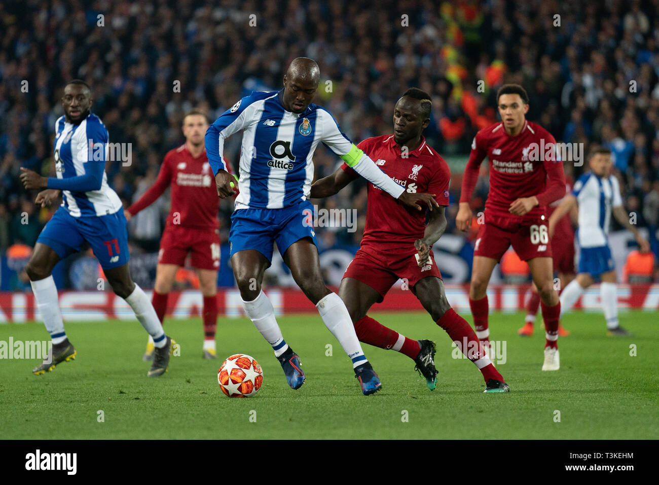 Porto’s Maxi Pereira under pressure from Liverpool's Sadio Mane  9th April 2019 , Anfield Stadium, Liverpool, England;  EUFA Champions League Quarter Final, First Leg, Liverpool FC vs FC Porto   Credit: Terry Donnelly/News Images Stock Photo