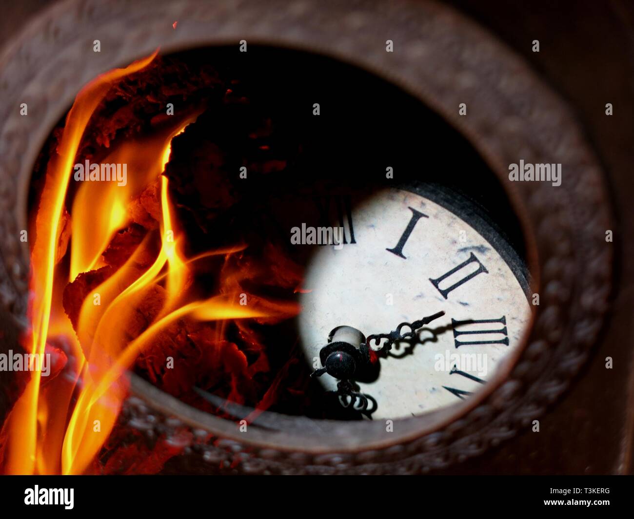 Broken clock on fire. Conceptual photography Stock Photo Alamy