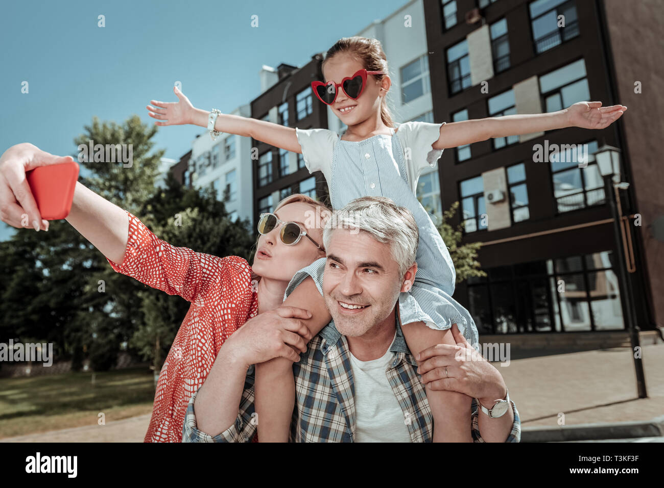 Positive happy family taking a selfie together Stock Photo