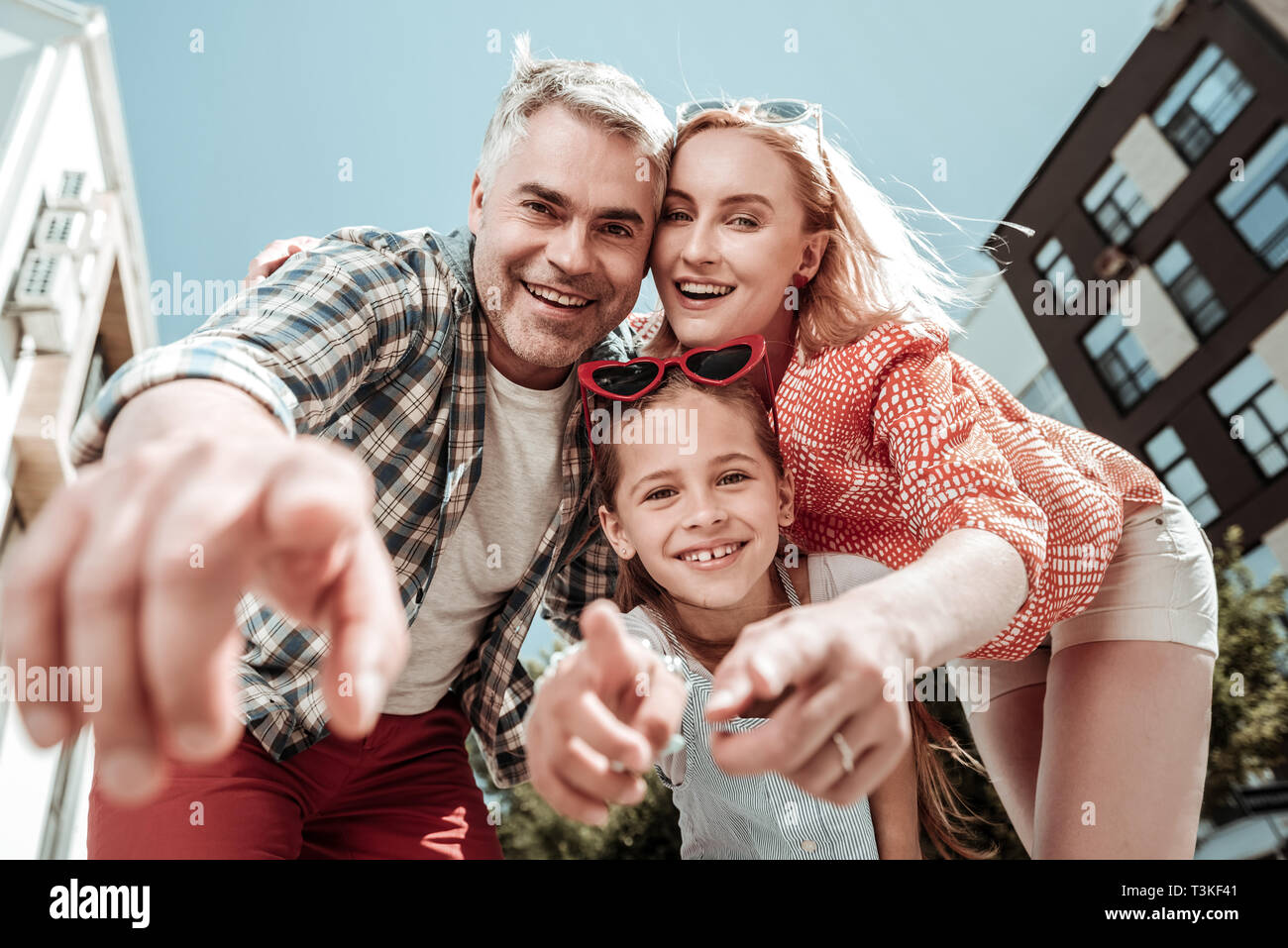 Delighted happy man pointing at the camera Stock Photo