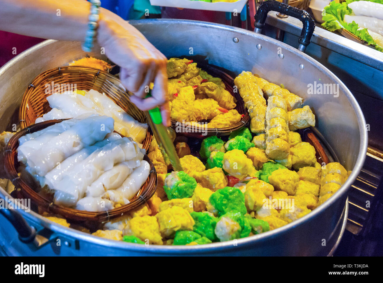 Steamed dumplings in a big pot, Chiang mai night market Stock Photo