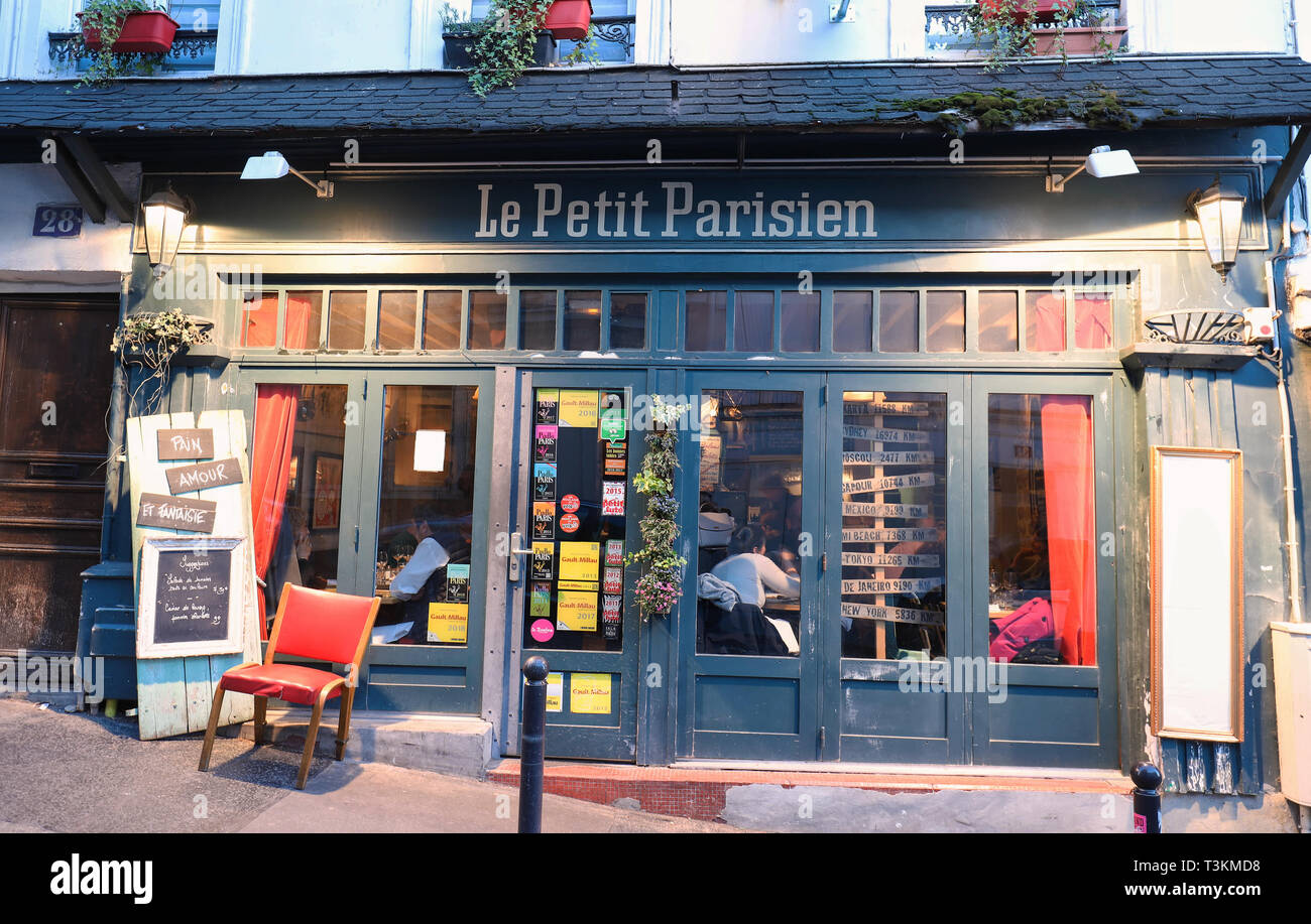 The traditional French restaurant Le Petit Parisien located in Montmartre in 18 district of Paris, France. Stock Photo
