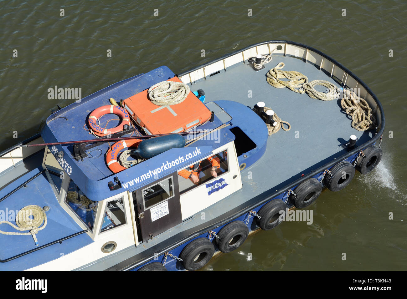 The Marine Support Thames workboat Pronto on the River Thames under Hammersmith Bridge supervising repairs Stock Photo