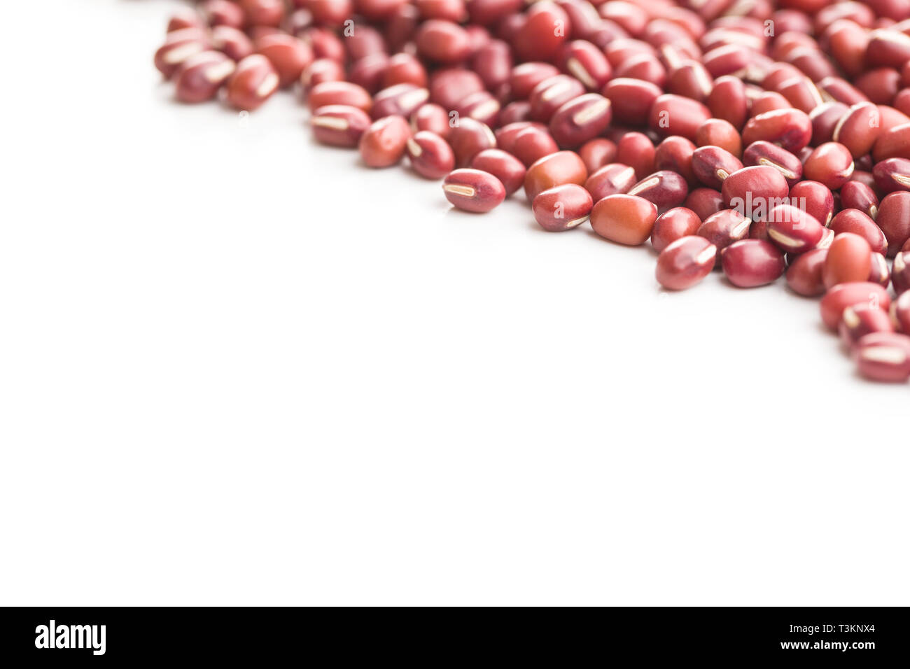 Red adzuki beans isolated on white background. Stock Photo