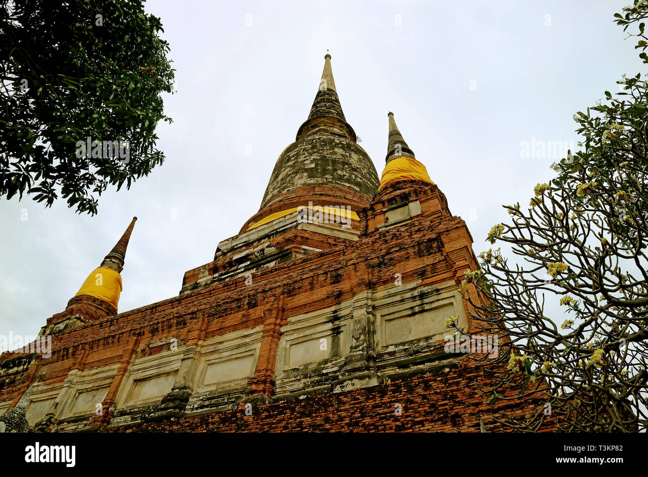 The Historic Stupa or Chedi of Wat Yai Chai Mongkhon Temple against Cloudy Sky, Ayutthaya Archaeological site, Thailand Stock Photo