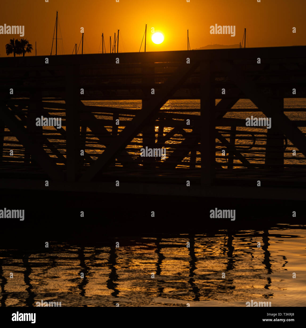 Silhouettes of the Marina Del Rey Harbor during sunset photographed from Marina Beach in Marina Del Rey, CA. Stock Photo