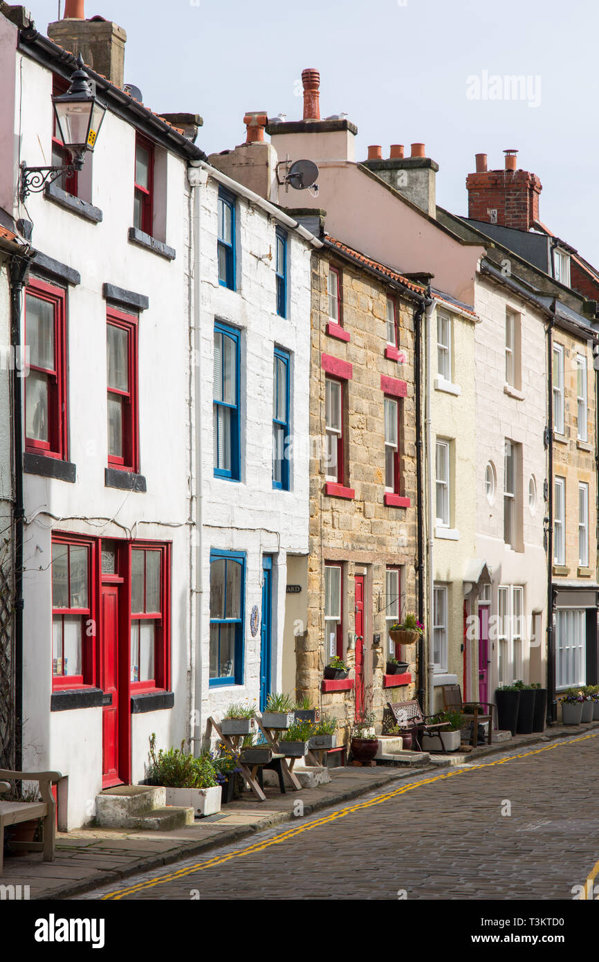 Colourful terraced cottages in High Street, Staithes, a traditional fishing village and seaside resort on the North Yorkshire coast, England UK. Stock Photo