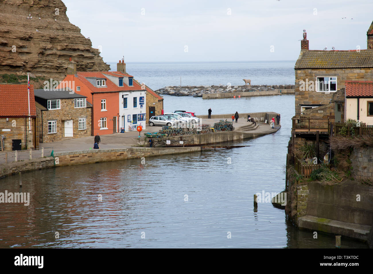 A view of the harbour and fishermens cottages in Staithes, a traditional fishing village and seaside resort on the North Yorkshire coast, England UK. Stock Photo