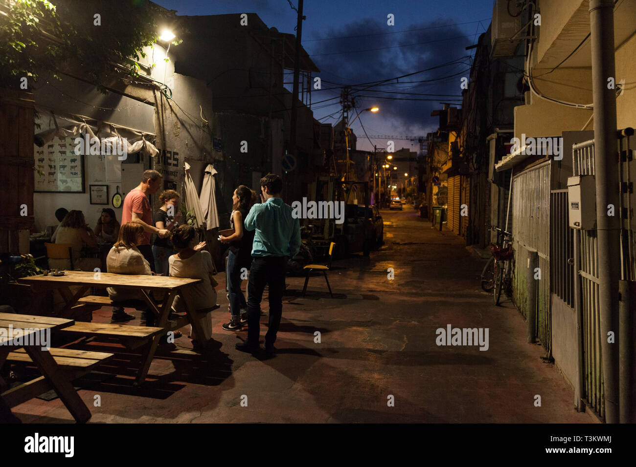 bar in Carmel Market area at night, Tel Aviv, Israel Stock Photo