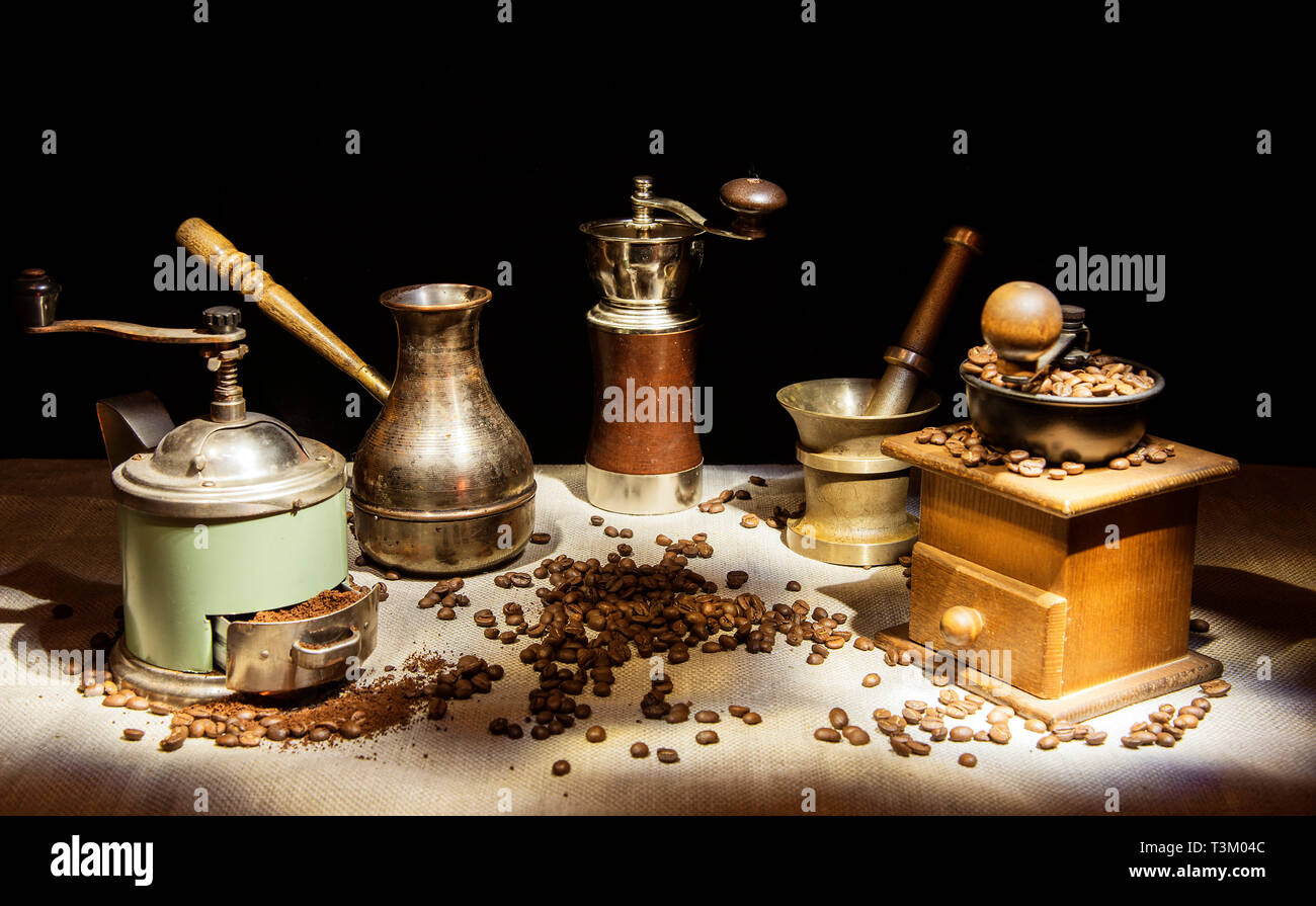 Mini collection of retro coffee grinders, Turk and mortar with pestle. Vintage Stock Photo Alamy
