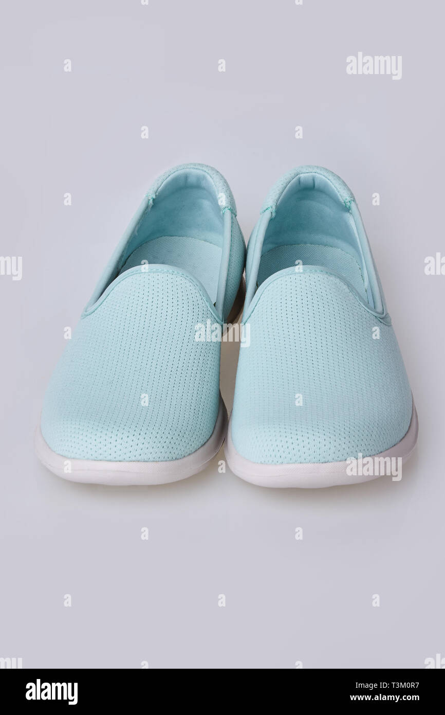 light blue slip ons