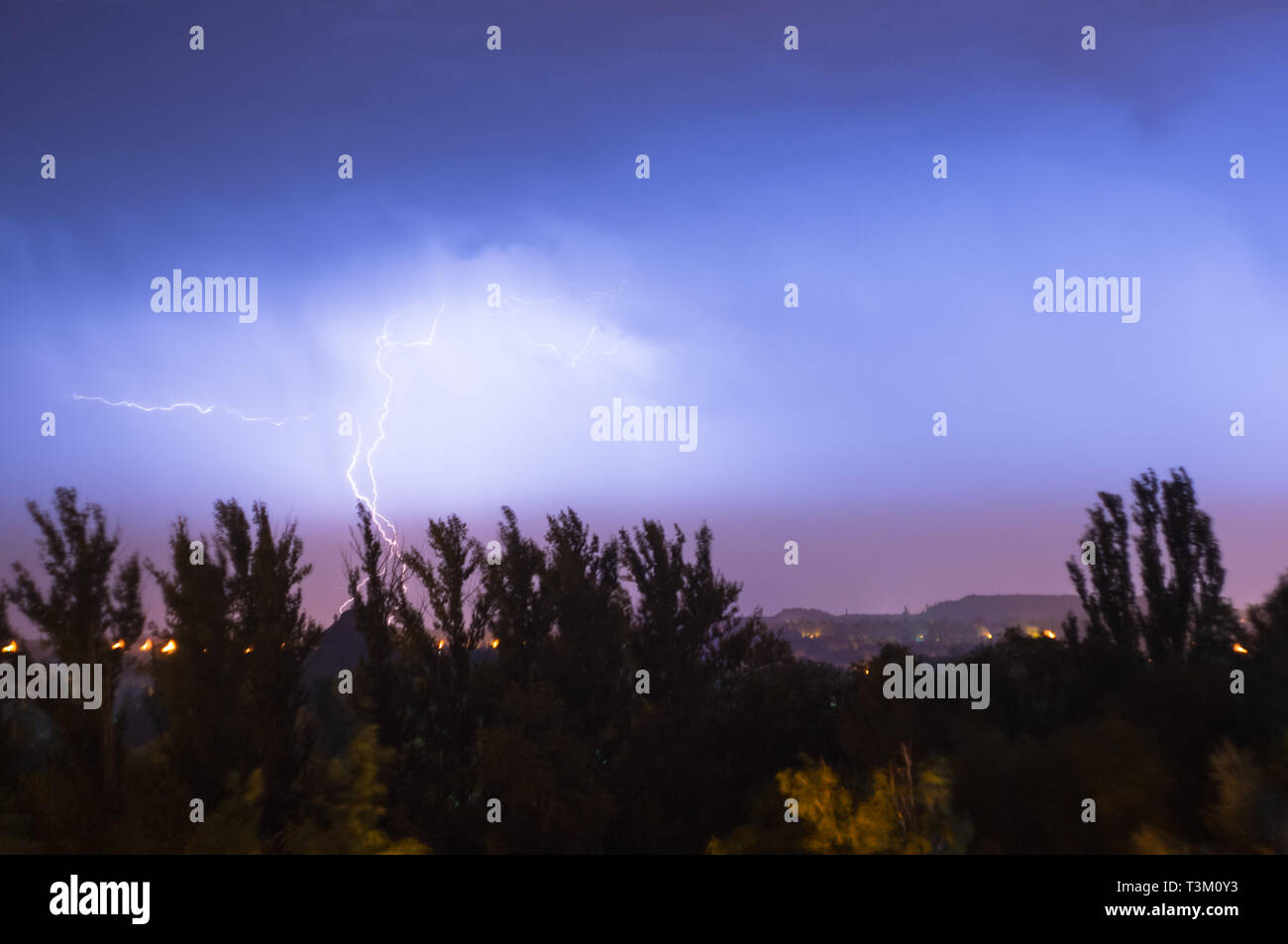 Night lightning storm over city in dramatic lighting Stock Photo - Alamy
