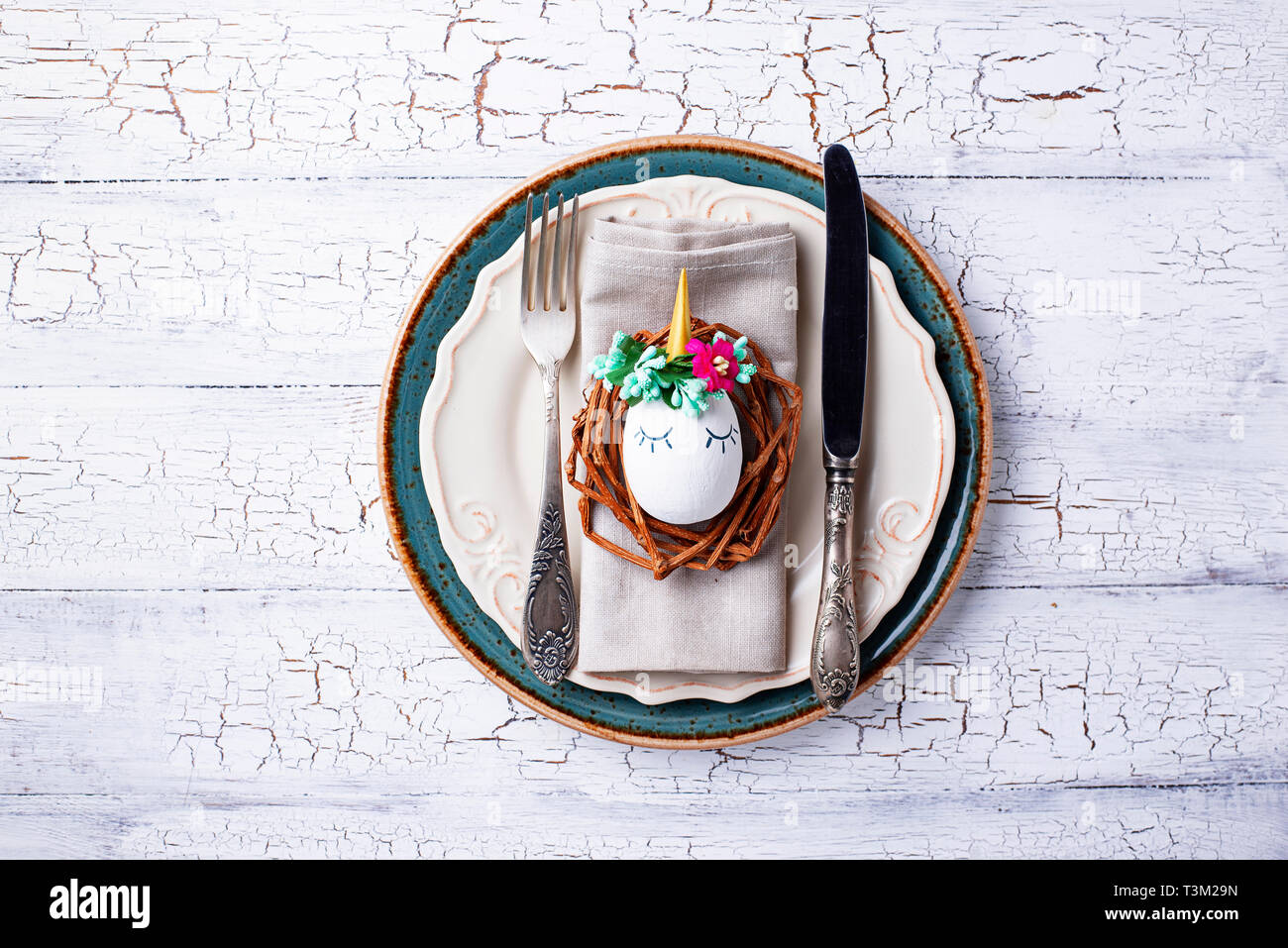 Easter table setting with quail eggs Stock Photo