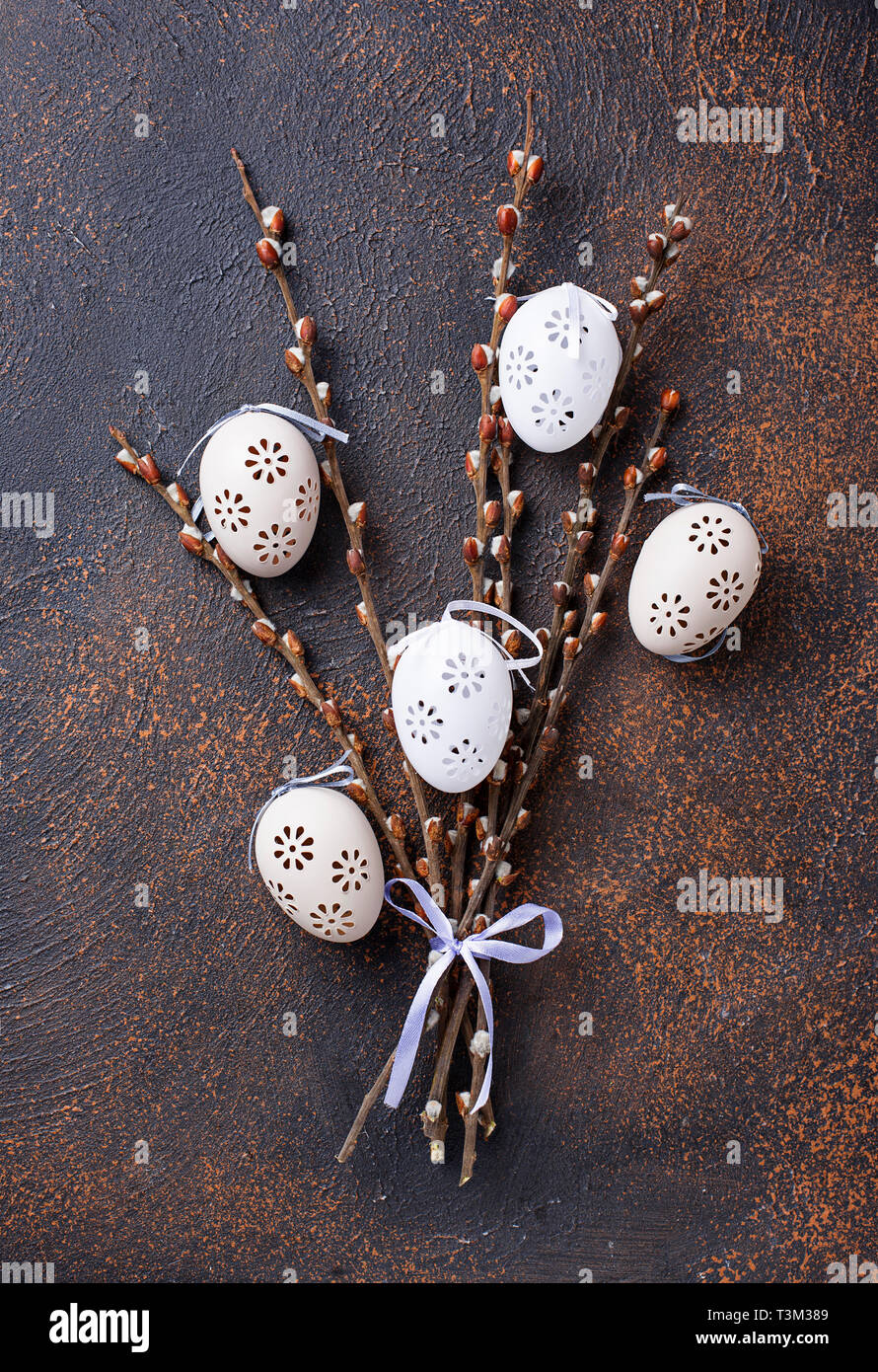 Easter background with willow and eggs Stock Photo - Alamy