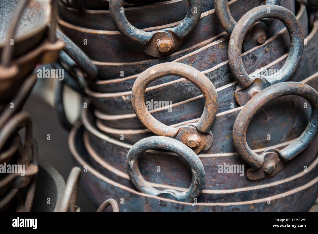 Stack of metal cooking pots for sale at Ason Tol market place Stock Photo