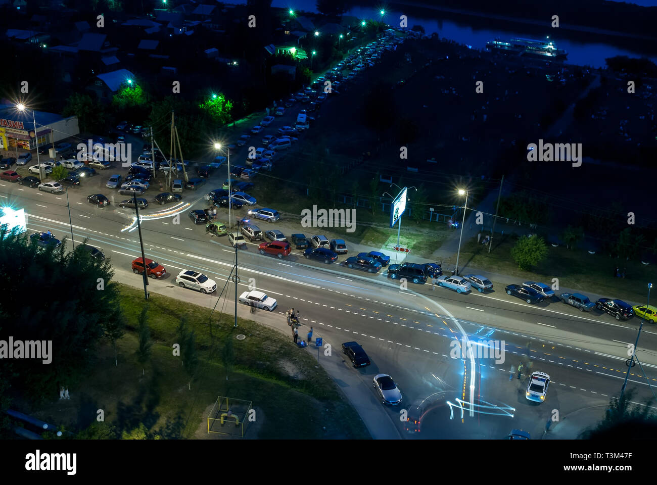 Cars along road and post of traffic police. Tyumen Stock Photo - Alamy