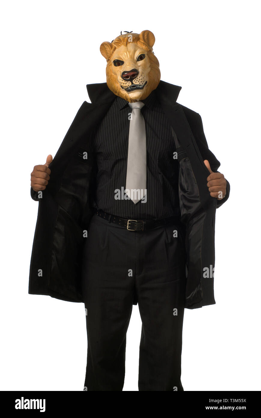 suit in a lion mask Stock Photo