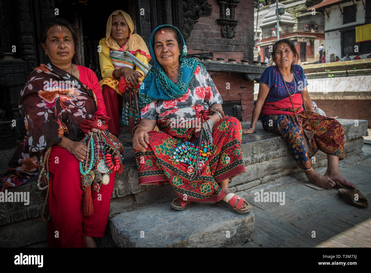 Women selling jewellery to tourists at pashupatinath tempal, Nepal Stock Photo