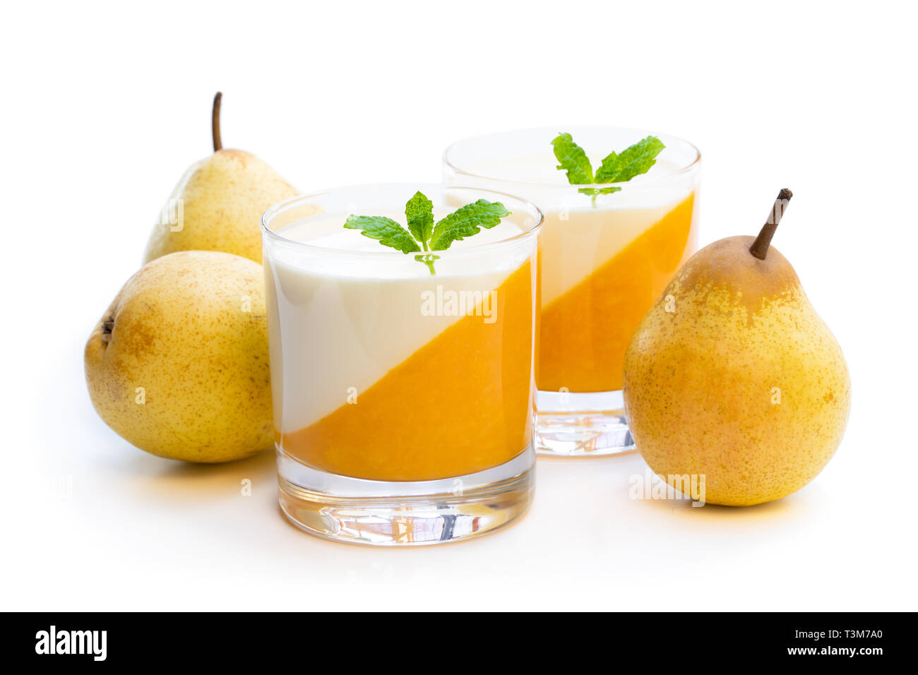 Panna  cotta with pear jelly in clear glass isolated on white Stock Photo