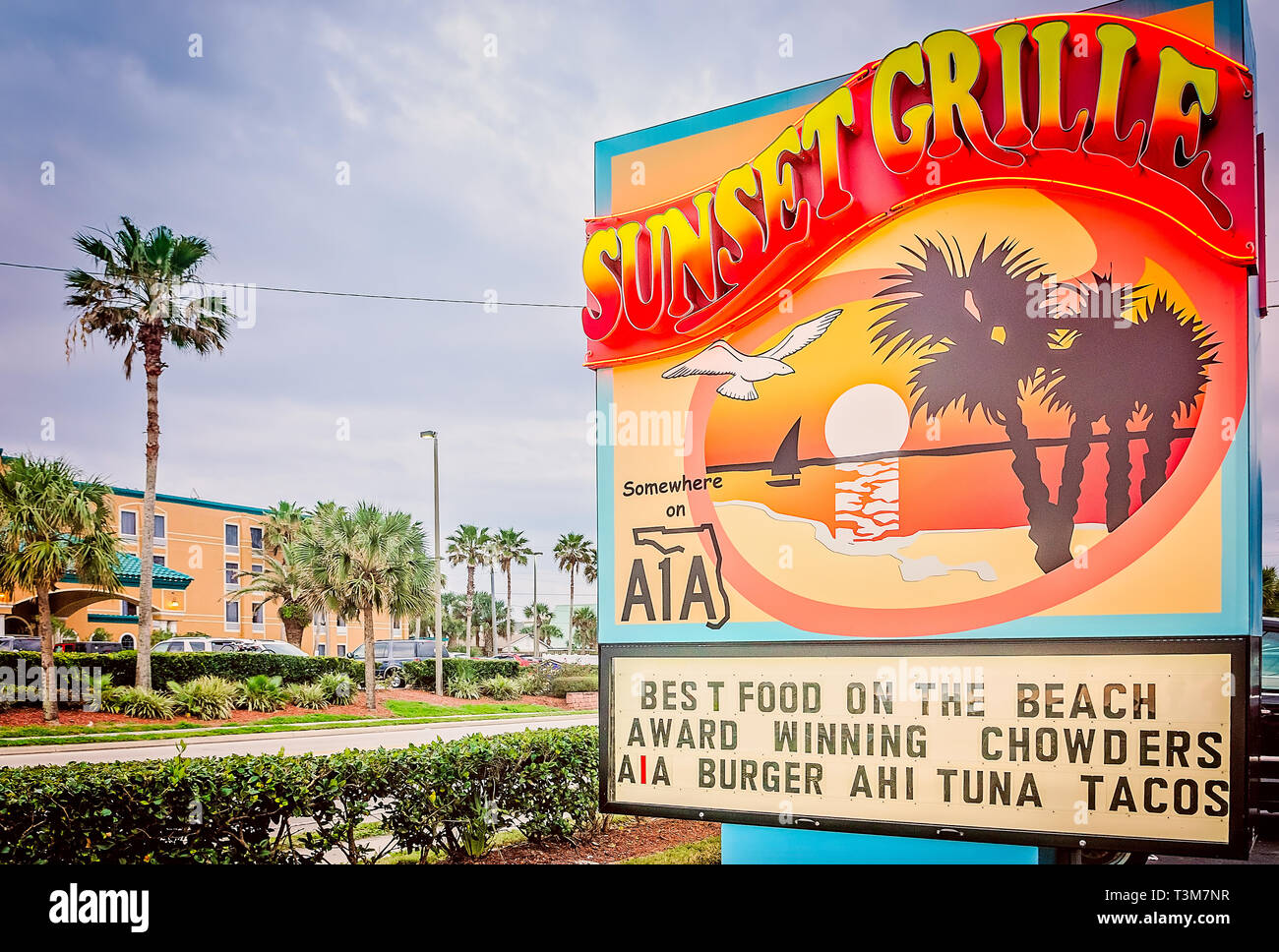 A sign advertises the Sunset Grille, March 19, 2016, in St. Augustine, Florida. The restaurant opened in 1990 and offers a laidback atmosphere. Stock Photo
