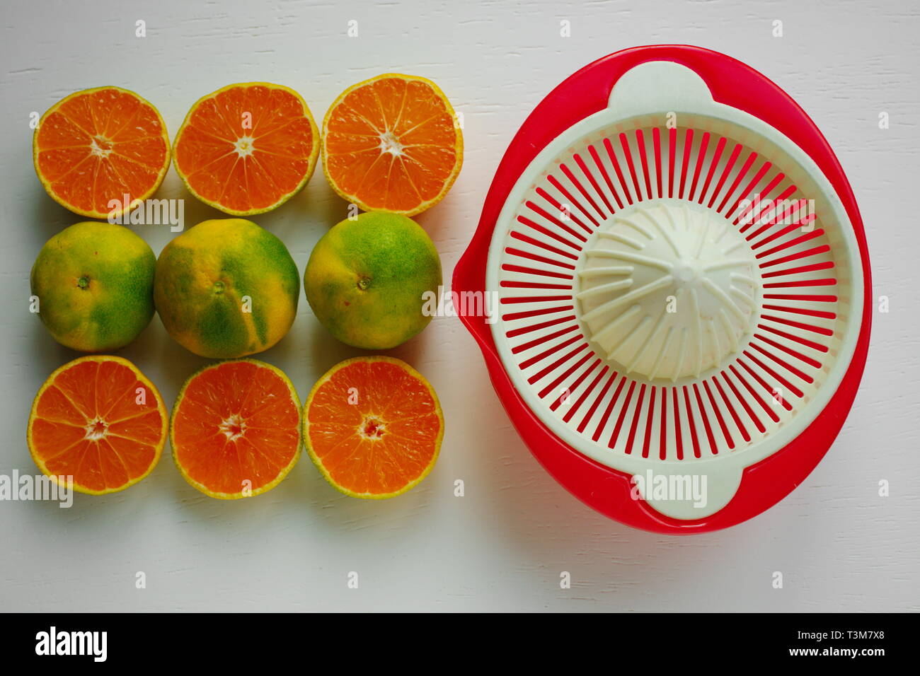 tangerine juice preparation. heap of fresh organic fruits. top view