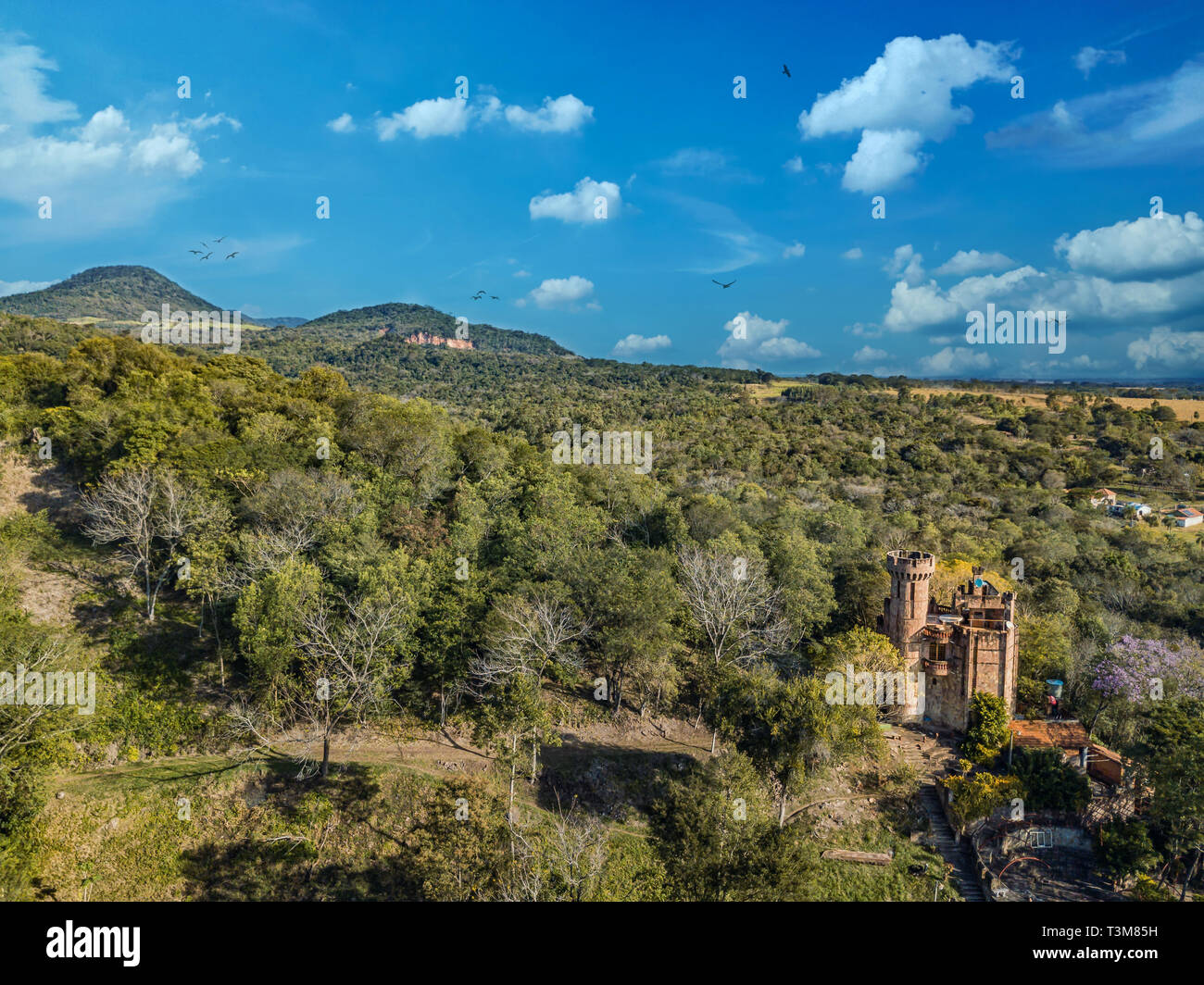 Aerial view of a castle in Paraguay overlooking the Ybytyruzu Mountains. Stock Photo