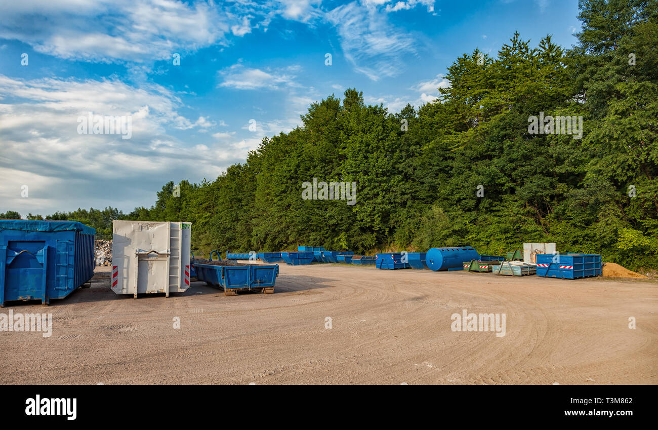 Recycling yard with different containers. Stock Photo