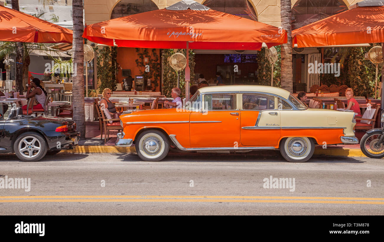 Miami, United State - April 7, 2014: A Chevrolet Bel Air in front of a bar on Oceans Drive in South Beach. Stock Photo