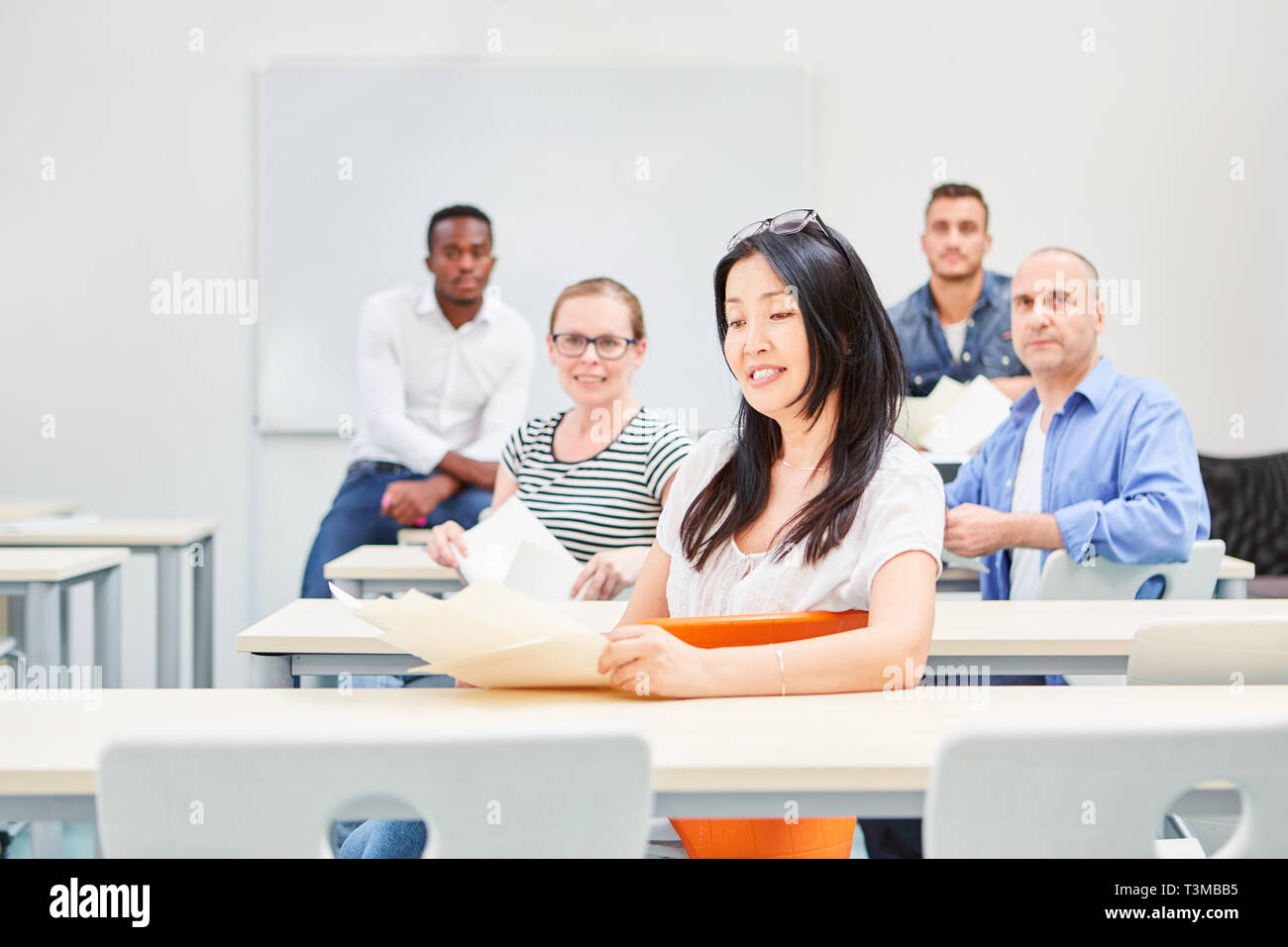 Group of students learning together in a university seminar or training Stock Photo
