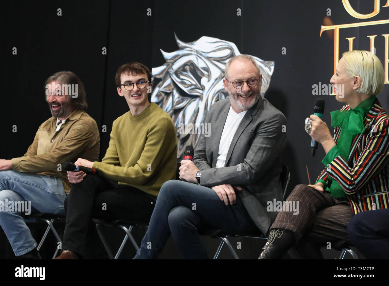 Left to right; actors Ian Beattie, Isaac Hempstead Wright and Liam Cunningham, with costume designer Michele Clapton (right) at the launch of the Game of Thrones touring exhibition at the Titanic Exhibition Centre in Belfast. Stock Photo
