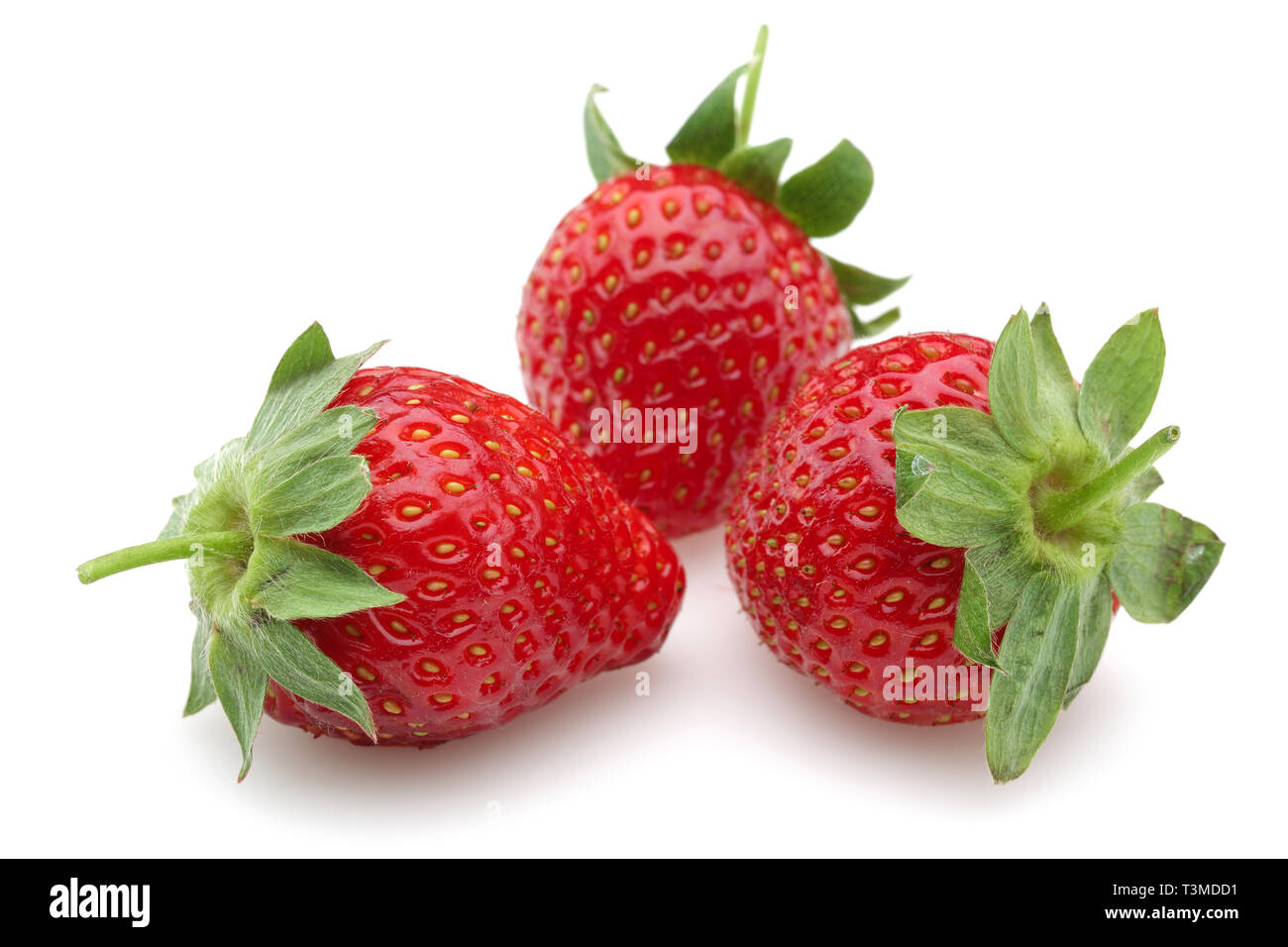 Whole fresh strawberries isolated on white background Stock Photo - Alamy