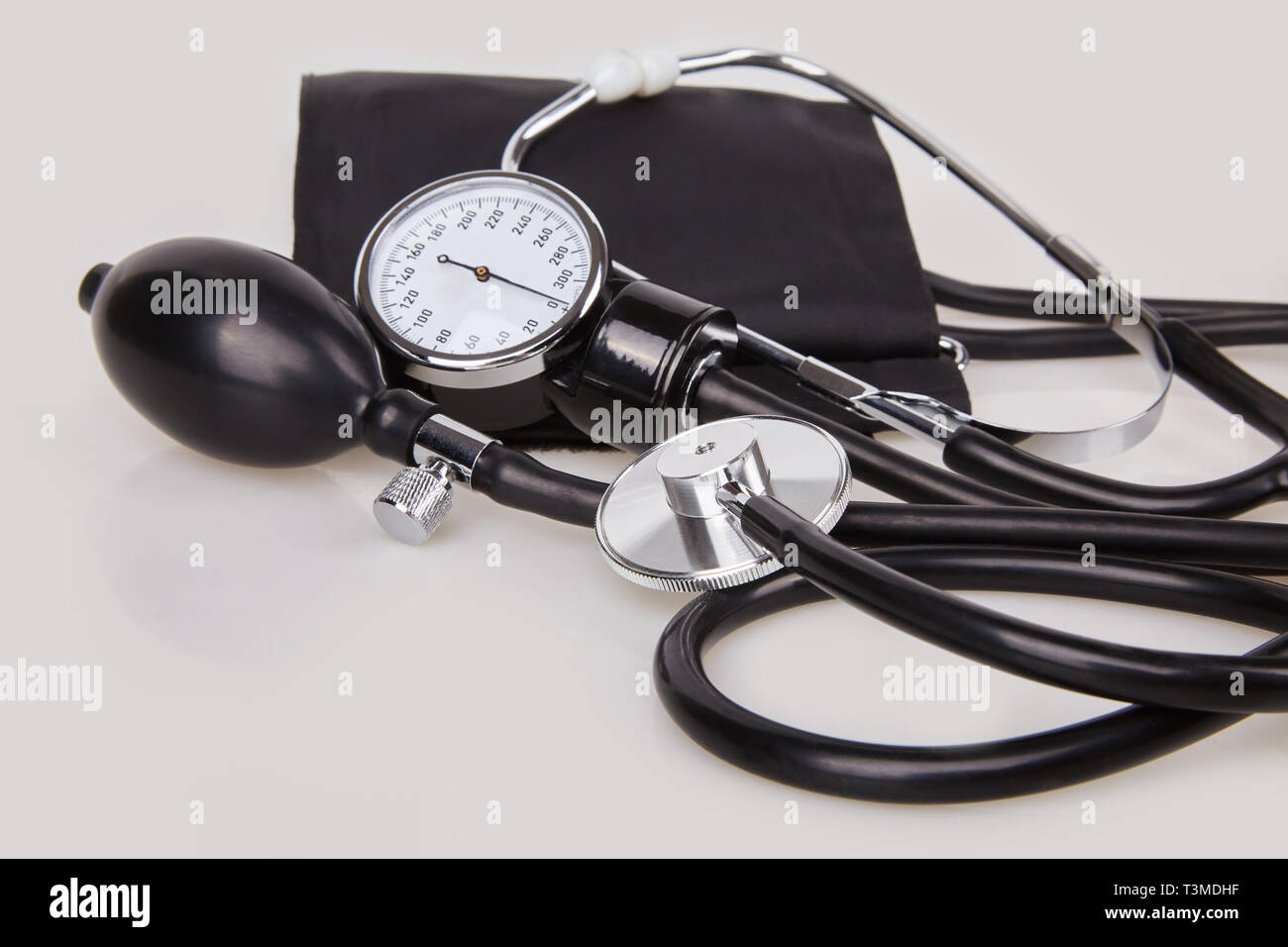 Close up view of black stethoscope and sphygmomanometer isolated on