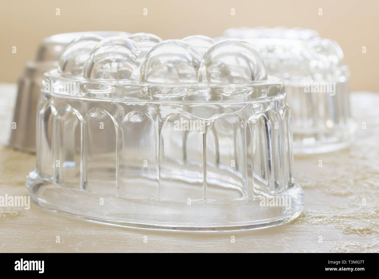 Old fashioned glass jelly or blancmange moulds for making traditional jellies Stock Photo Alamy