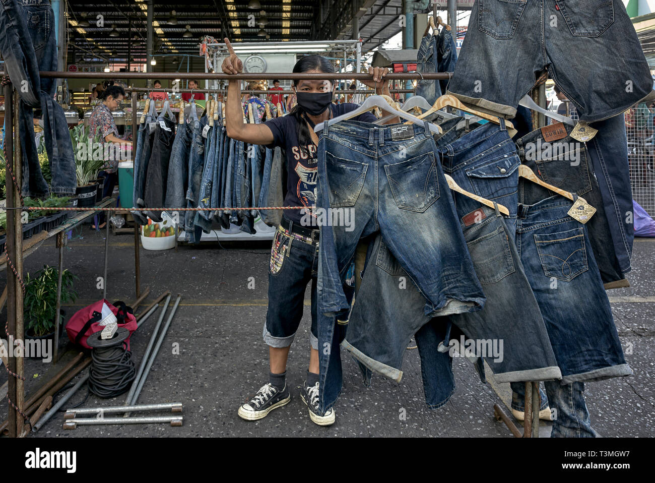 Denim jeans for sale at a Thailand market Stock Photo - Alamy