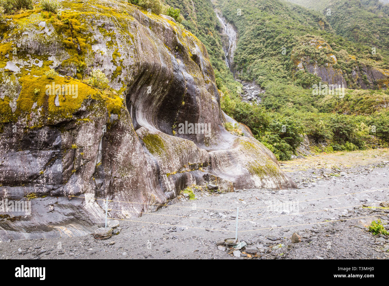 Rock face showing effect of glacial erosion, Franz Josef glacier, New Zealand Stock Photo