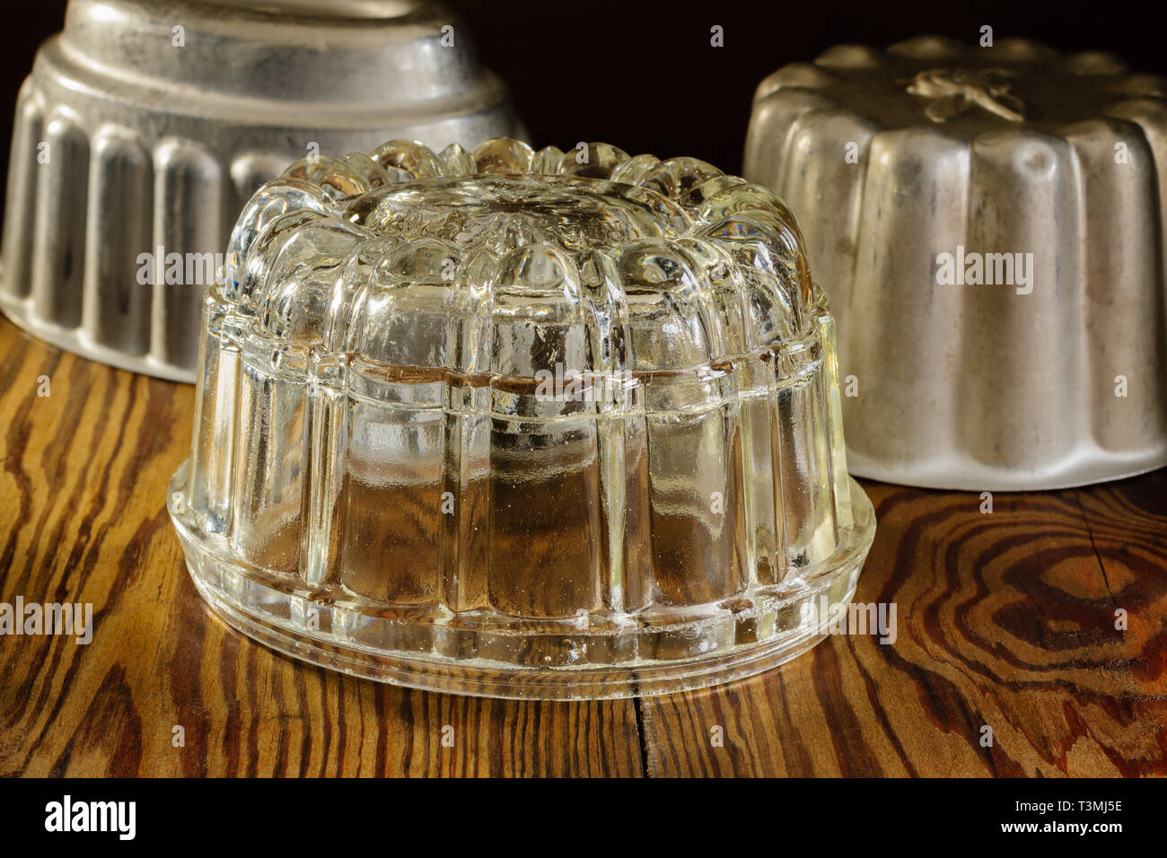 Old fashioned glass and aluminum jelly or blancmange moulds for making